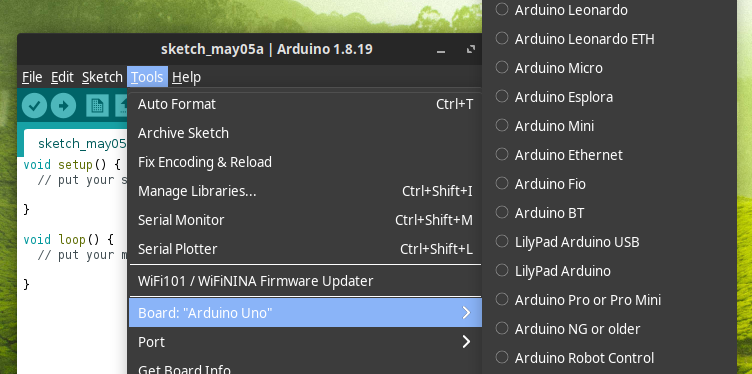 A screenshot of the old Arduino IDE, a precarious number of menus to select a board.